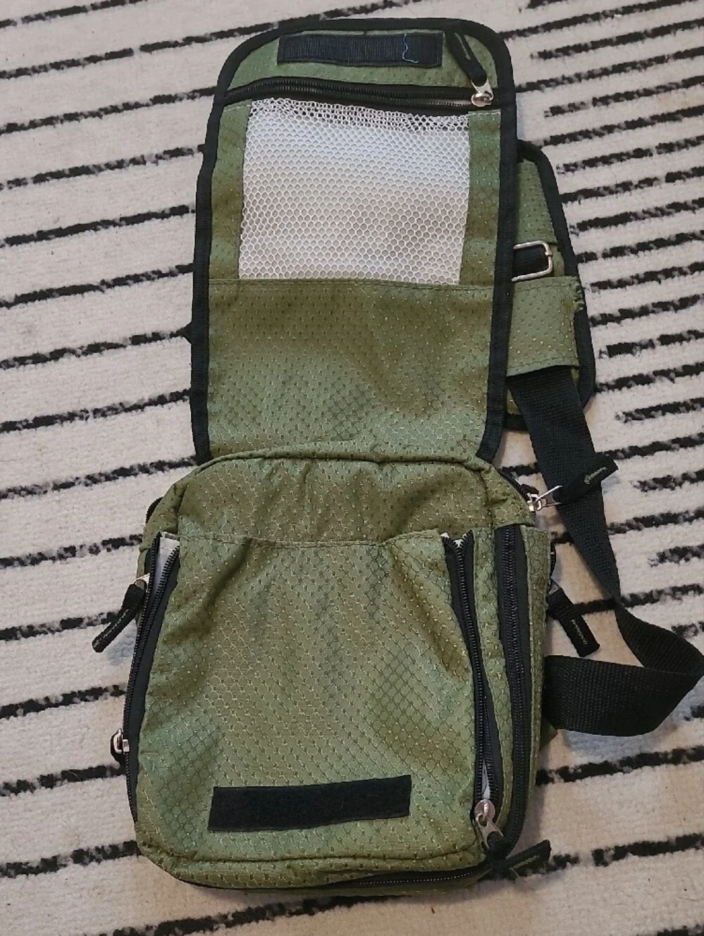 HEYS Olive Green Sling Messenger Bag with Adjustable Strap